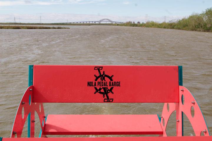 a wooden bench sitting next to a body of water