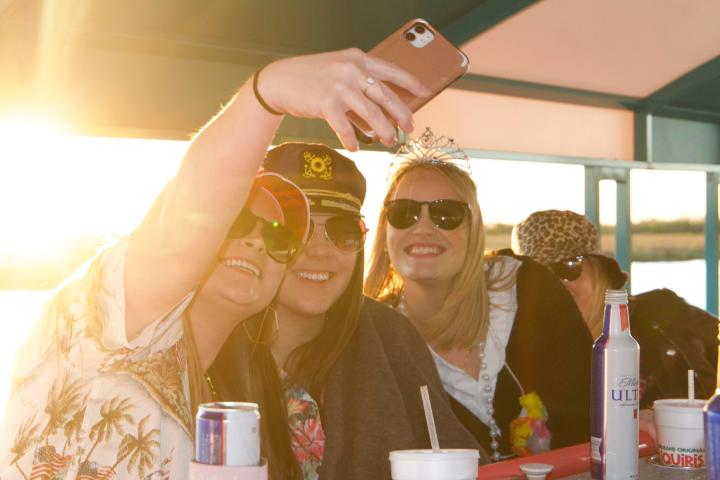 a woman holding a cup